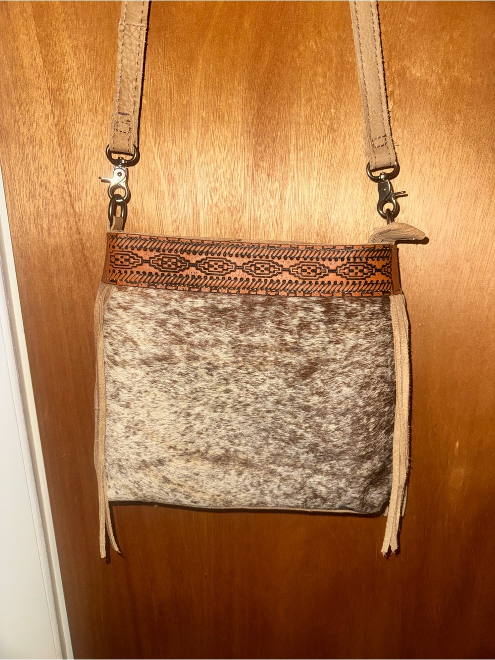 Cowhide fringe purse